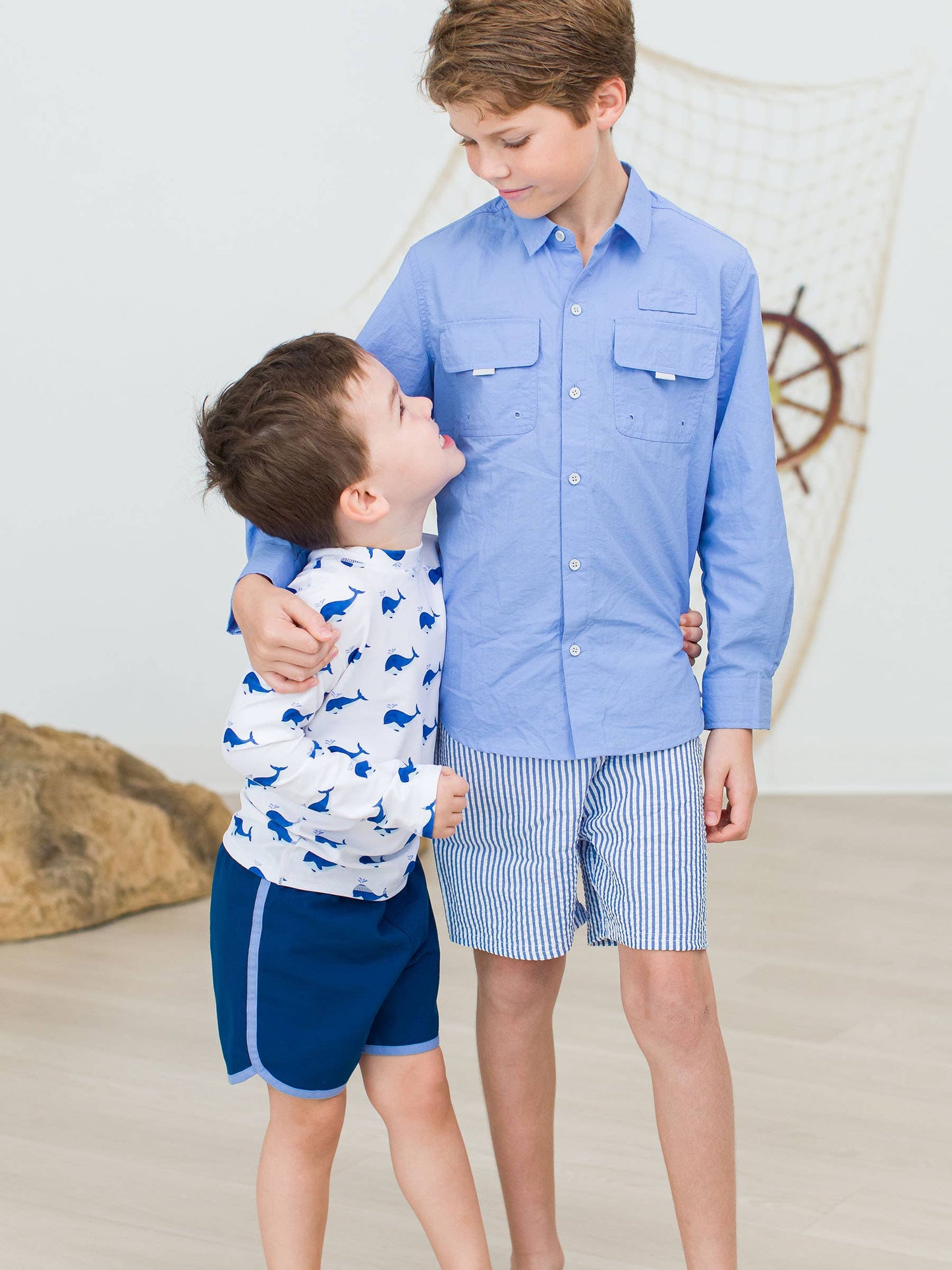Boys Navy Dolphin Hem Swim Trunks
