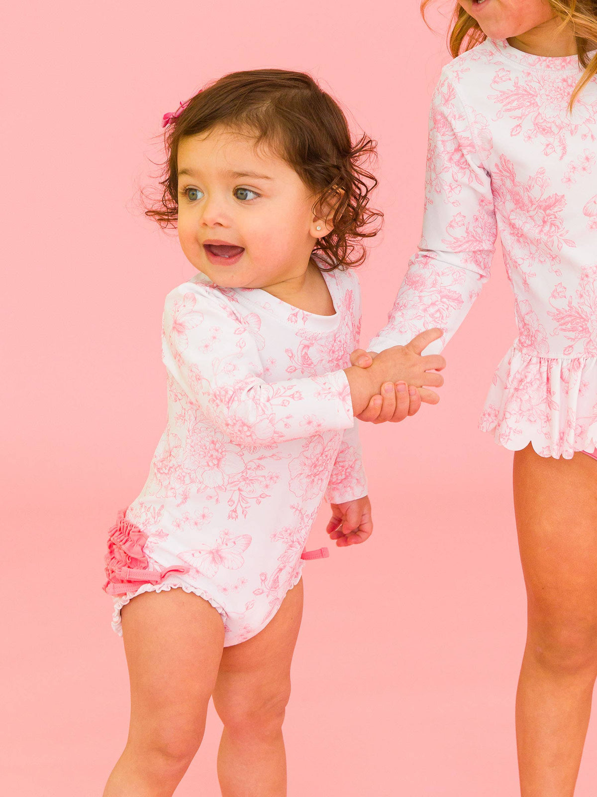 Baby Girls Bubblegum Pink Butterfly Garden Toile Long Sleeve One Piece Rash Guard Swimsuit with Signature Rear Ruffles